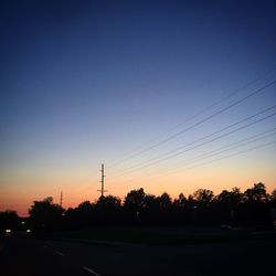 Scenic view of landscape against sky at sunset