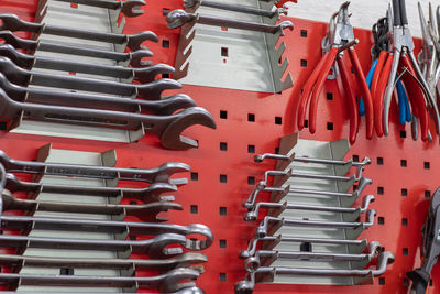 Close-up of work tools on workbench at workshop