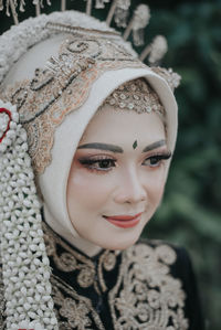 Close-up portrait of young woman java culture