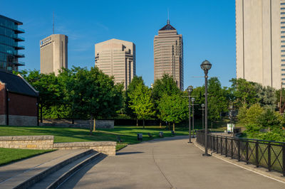 Street amidst buildings against sky