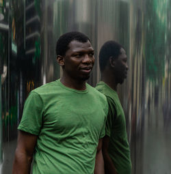 Portrait of young man standing outdoors