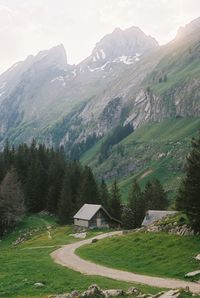 Scenic view of landscape and mountains against sky