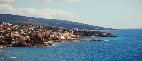 View of cityscape with sea in background