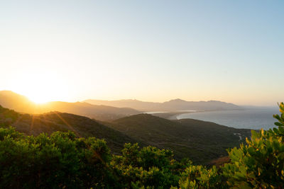 Scenic view of mountains against sky during sunset