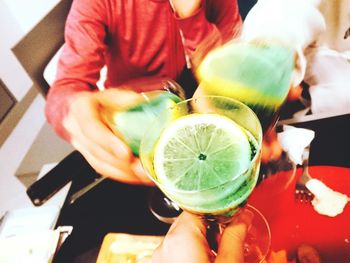 High angle view of hand holding drink