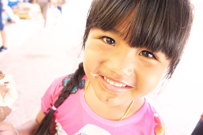 Close-up portrait of a smiling girl