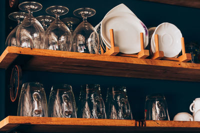 Close-up of bottles in shelf