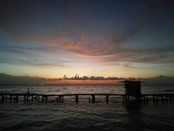 Scenic view of sea against sky at sunset