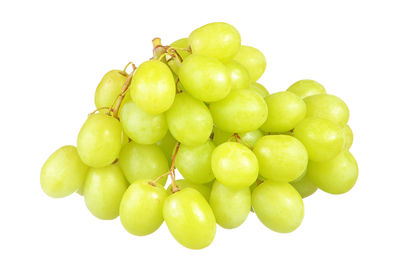 Close-up of grapes against white background