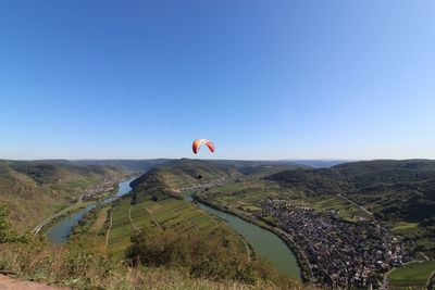 Scenic view of landscape against clear blue sky