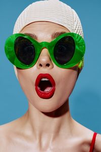 Close-up of young woman wearing sunglasses