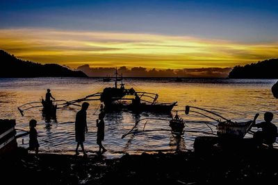 Scenic view of sea at sunset