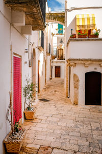 Alley amidst buildings in city