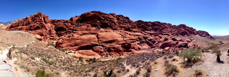 Rock formations on mountain against sky