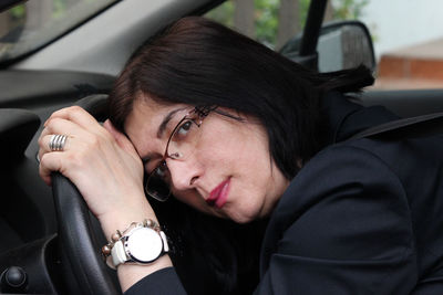 Portrait of woman in car