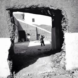 Man standing on wall