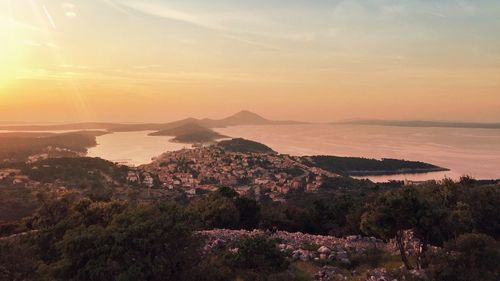 Scenic view of calm sea at sunset