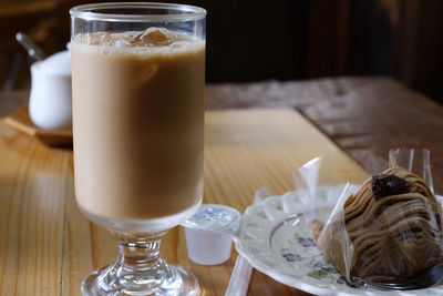 Close-up of coffee served on table