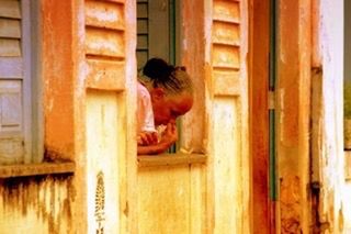 WOMAN WITH CLOSED DOOR