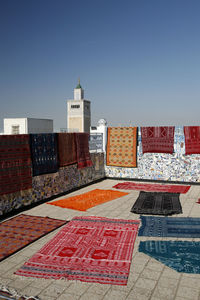 Multi colored roof of building against clear sky