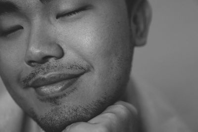 Close-up of smiling young man