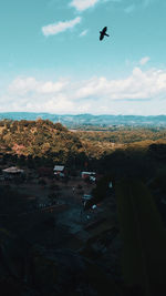 Aerial view of city against sky