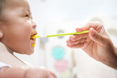 Close-up of boy eating food