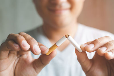 Close-up of man smoking cigarette