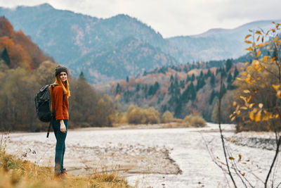 Full length of man standing on mountain