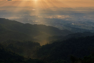 Scenic view of mountains against sky during sunset