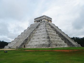 View of temple against cloudy sky