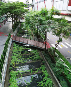 High angle view of railroad tracks by canal