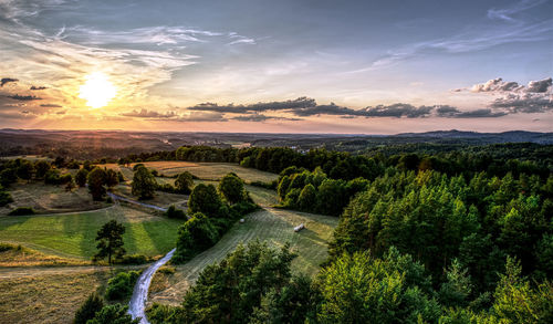 Scenic view of landscape against sky during sunset