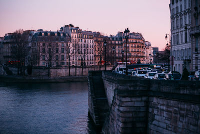 View of bridge in city against sky