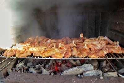 Close-up of meat on barbecue grill