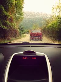 Road seen through car windshield