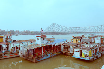 Bridge over river against clear sky