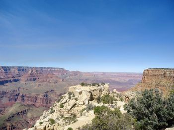 View of landscape against blue sky