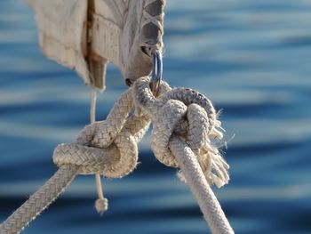 Close-up of rope tied to sail
