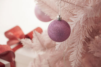 Close-up of christmas decoration hanging on tree