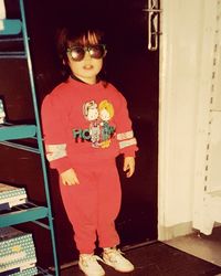 Young woman standing in room
