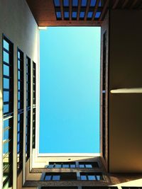 Low angle view of building against blue sky