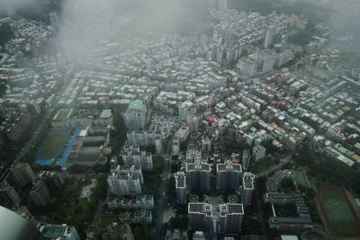 High angle view of street amidst buildings in city