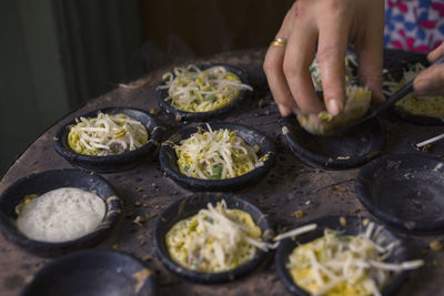 High angle view of person preparing food