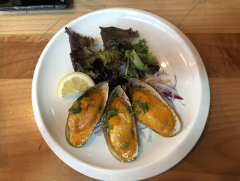 High angle view of fish in plate on table