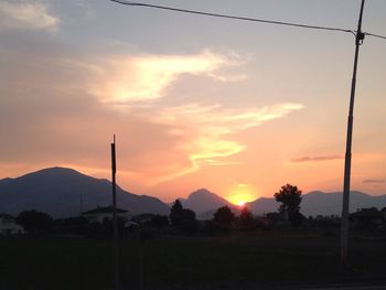 Scenic view of landscape against sky during sunset