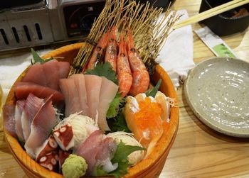 Close-up of seafood in container on table
