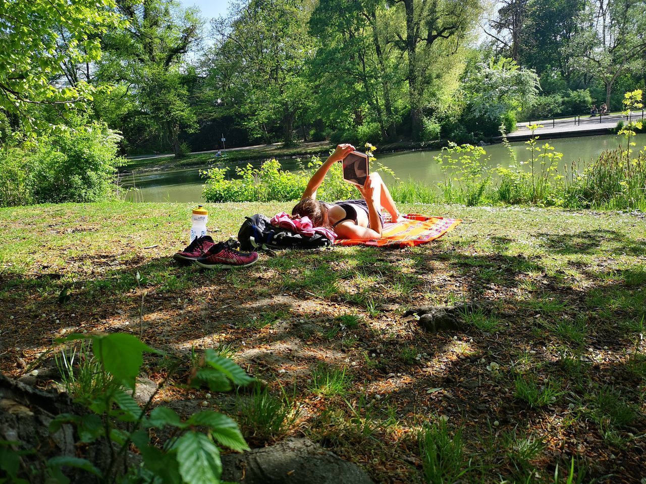 PEOPLE RELAXING ON FIELD