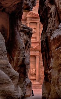 Man standing at the siq at petra