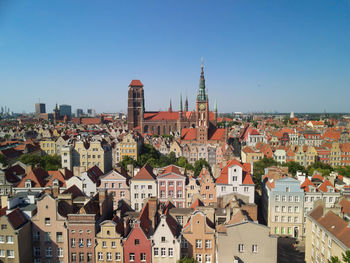 Aerial view of townscape against clear sky